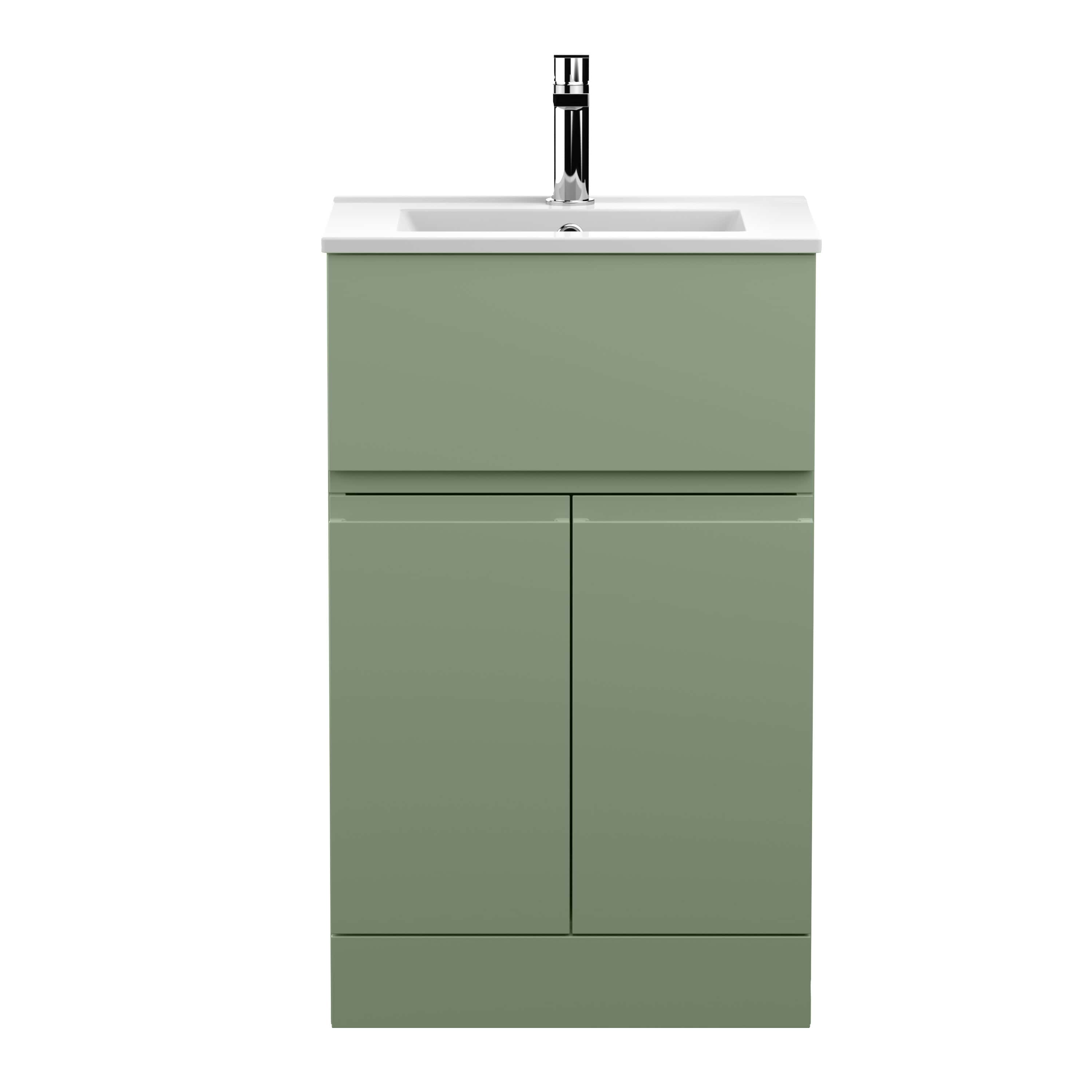 Modern green bathroom vanity unit with integrated sink and chrome tap, perfect for contemporary bathroom design.