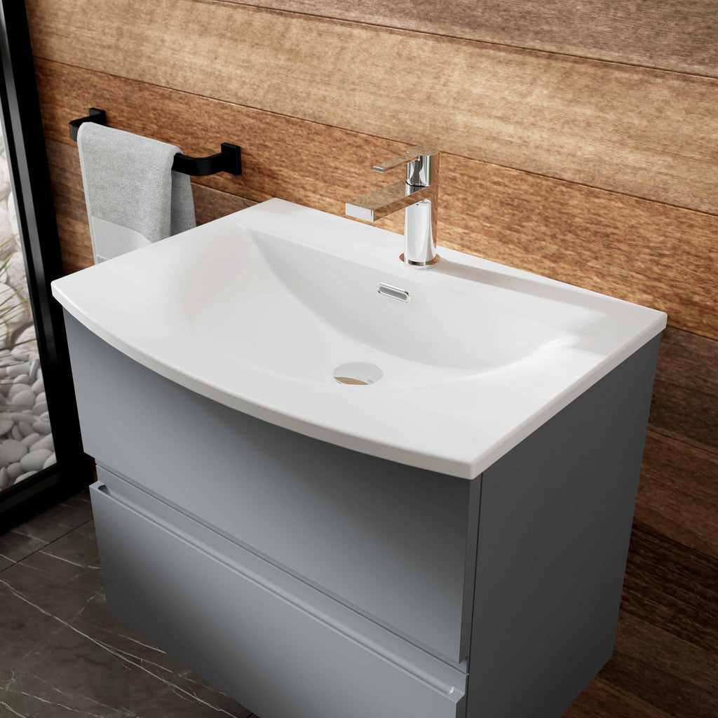 Sleek modern bathroom vanity with a white ceramic sink, chrome tap, and grey storage cabinet, perfect for contemporary bathroom design.