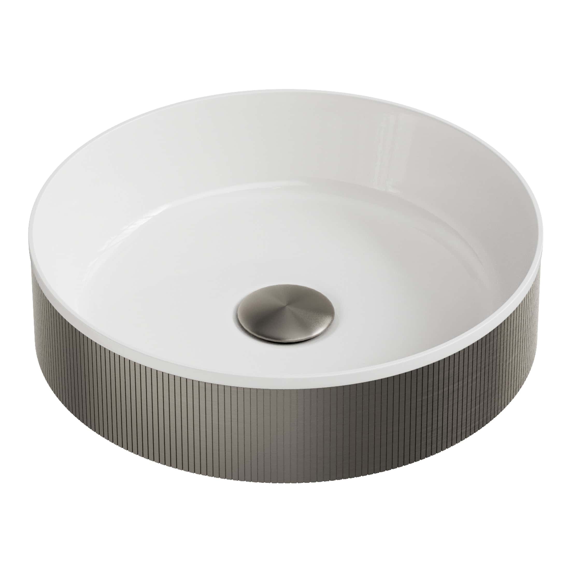 Sleek modern bathroom sink with a smooth white interior and textured grey exterior, featuring a central drainage outlet for contemporary bathroom design.