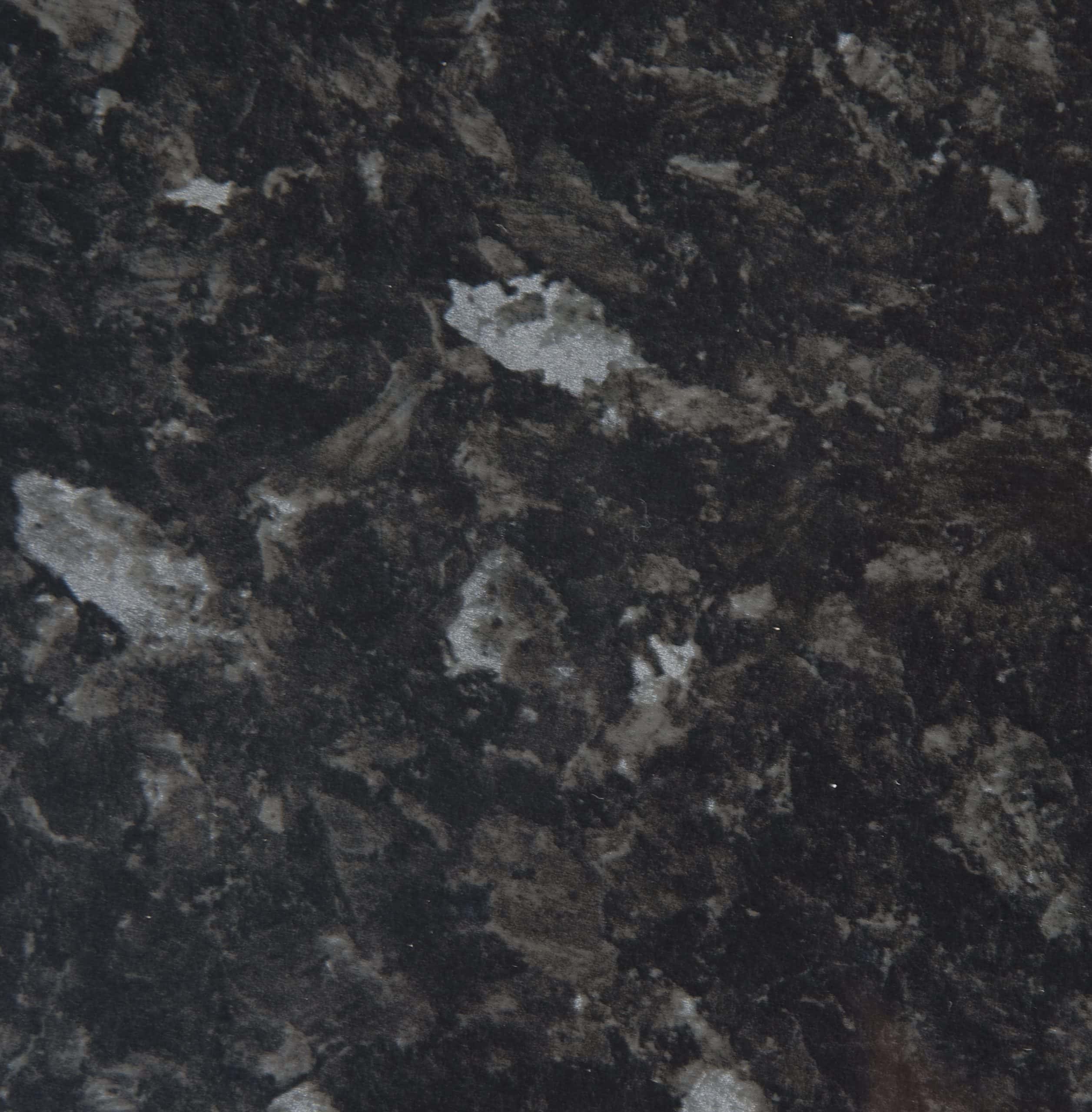 Bold black granite kitchen worktop surface with natural stone pattern, ideal for stylish bathroom or kitchen design. Durable and easy-to-maintain surface for modern interiors.
