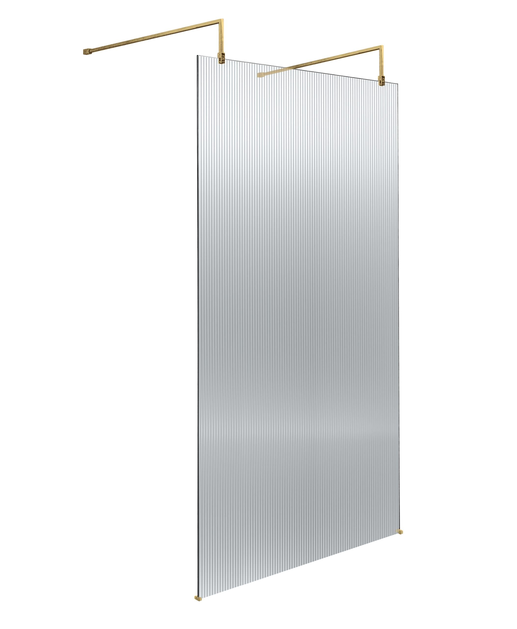 Clear acrylic shower screen with gold fittings and vertical ribbed texture for modern bathroom design.