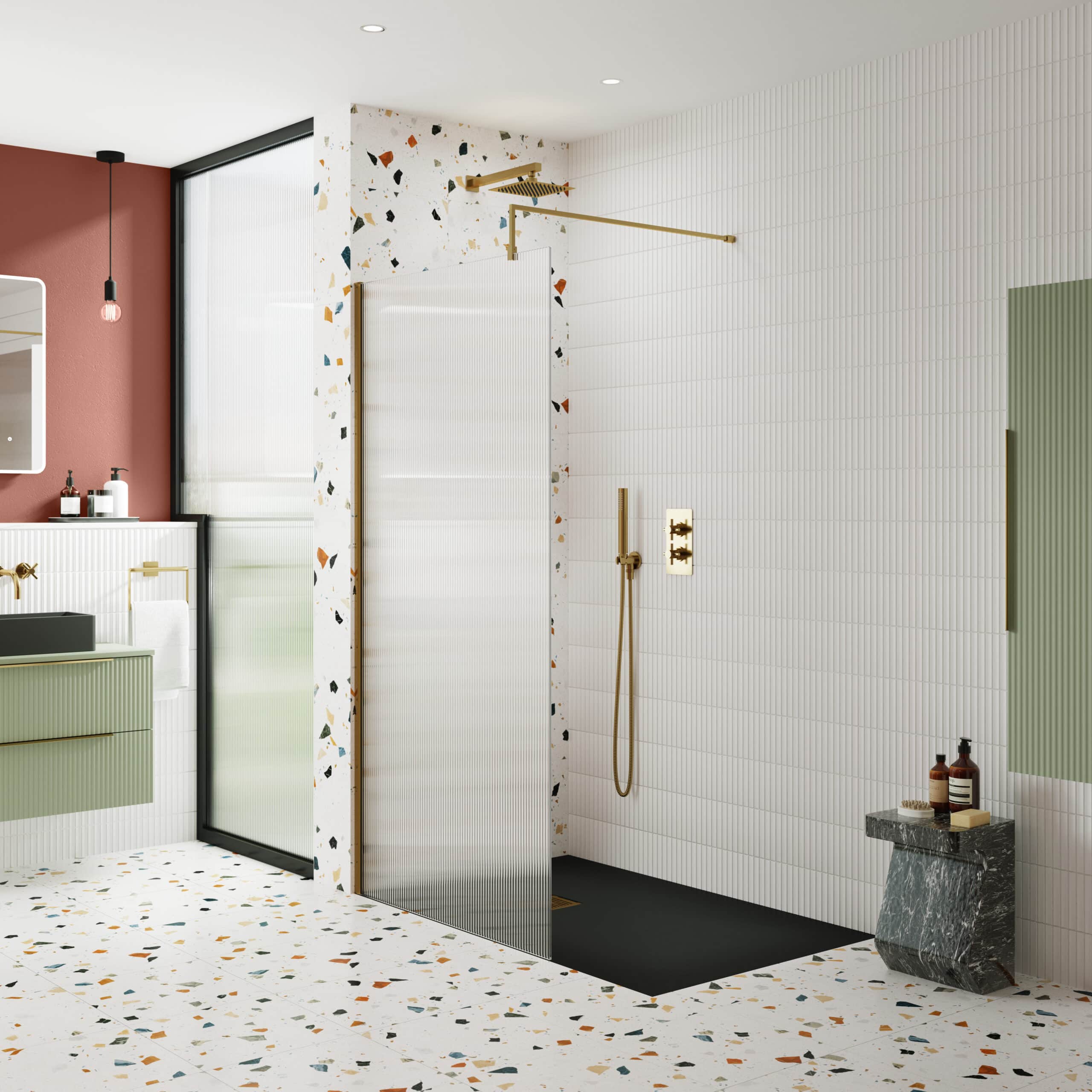 Modern bathroom shower area with terrazzo floor, terrazzo walls, and stylish gold fixtures in a contemporary design.